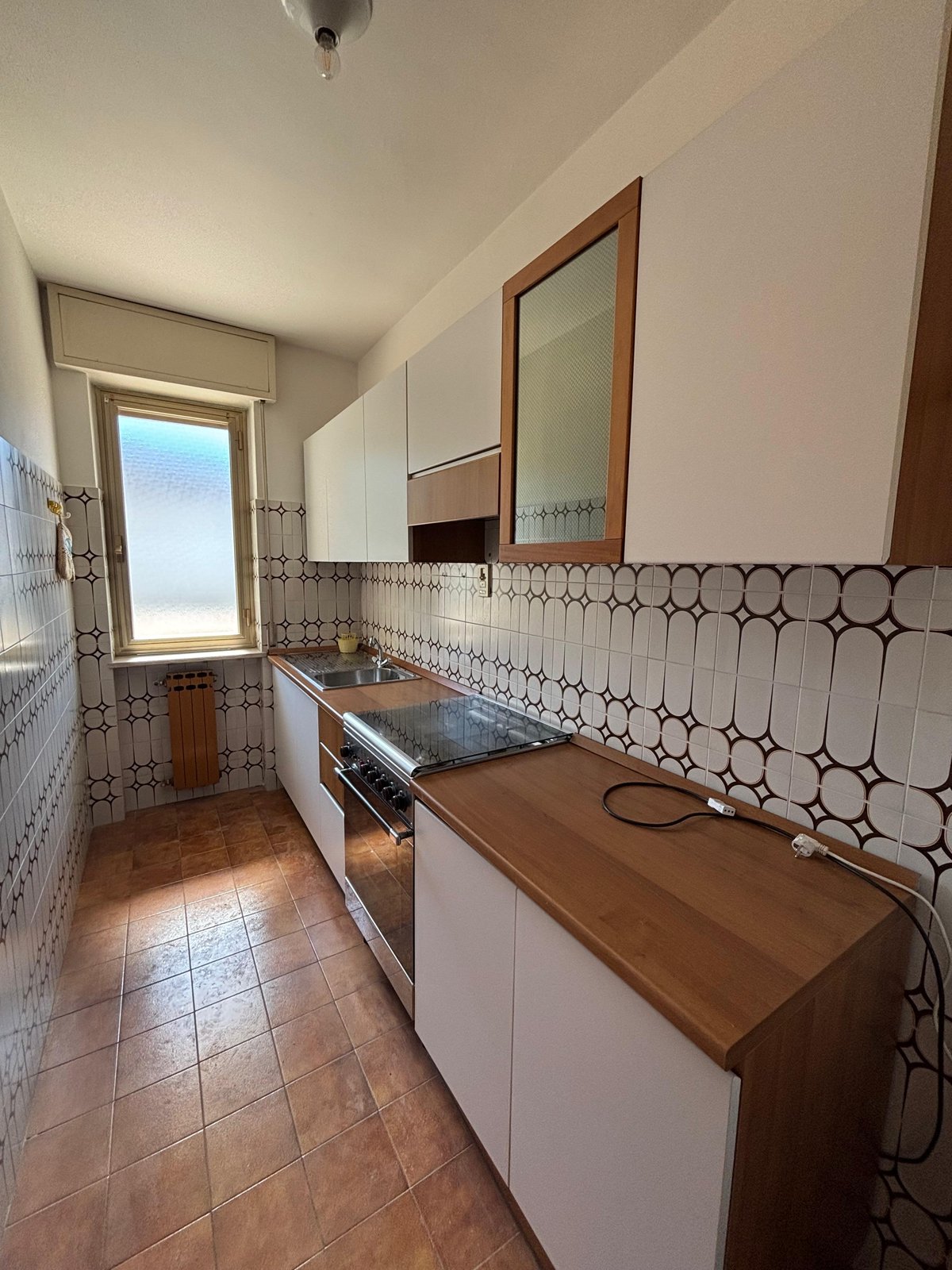 Cucina con cementine caratteristiche